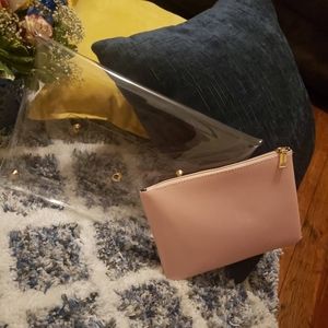 Clear clutch with blush pink clutch inside